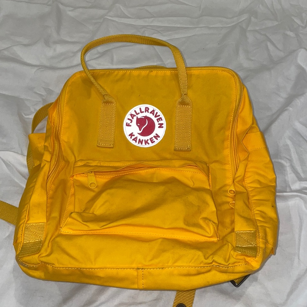 Fjallraven Kanken yellow backpack
